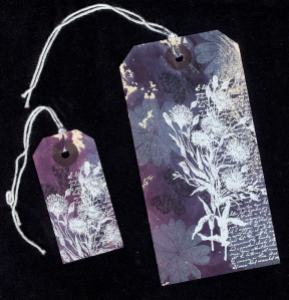 Two decorated luggage tags